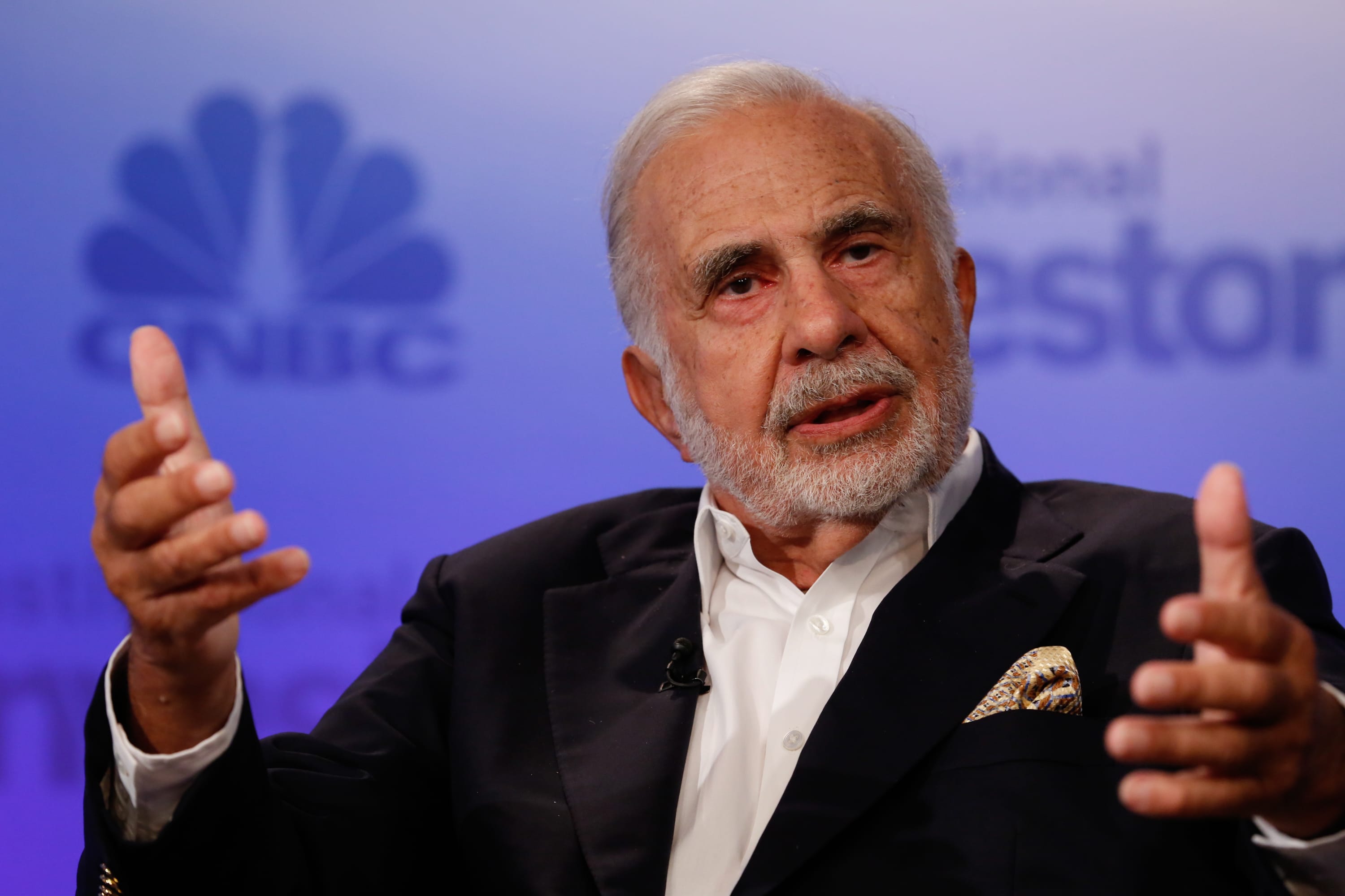Carl Icahn takes stake in HP, pushes for merger with Xerox
