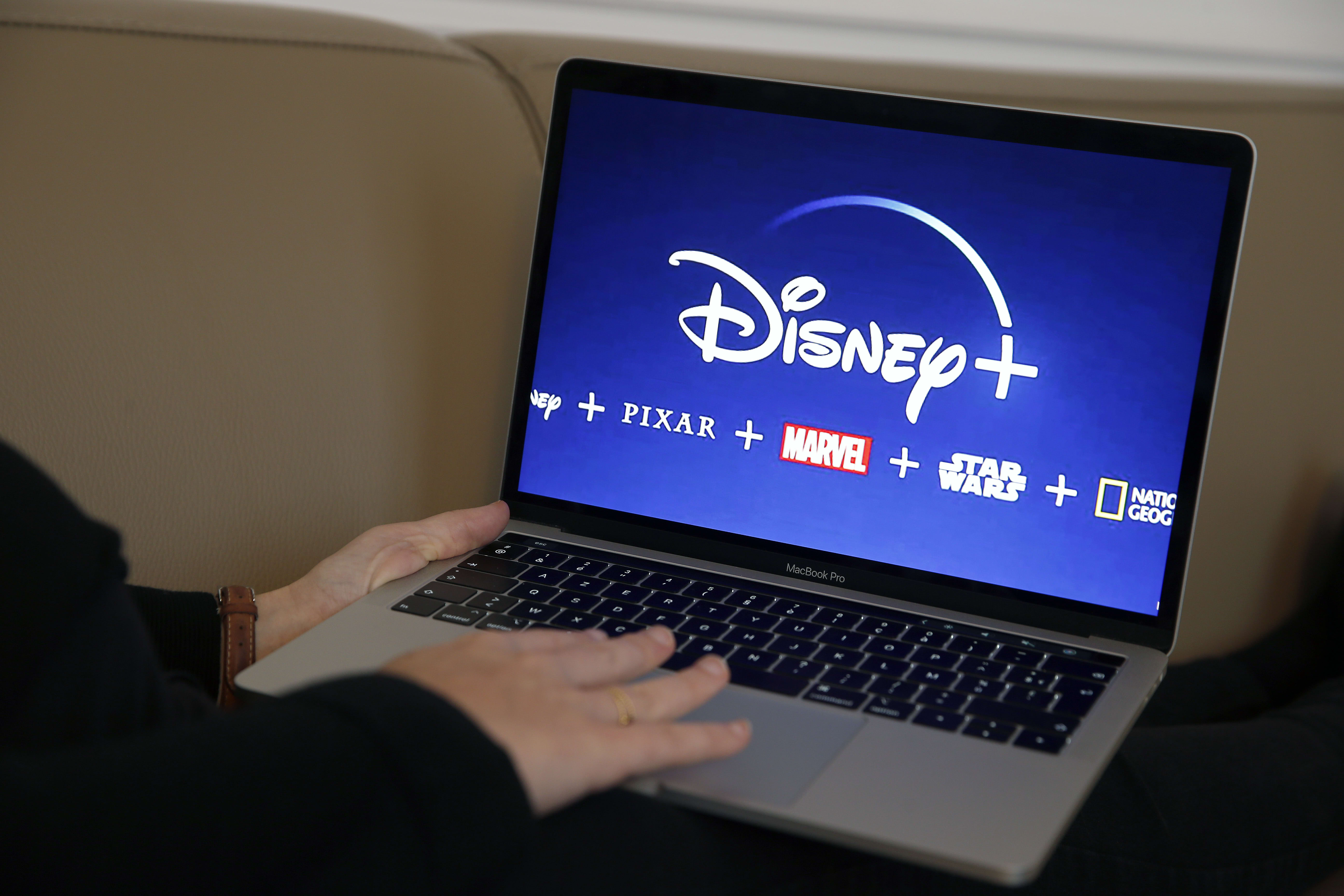 Credit score Suisse raises Disney value goal, subscriber estimates after sturdy Disney+ debut