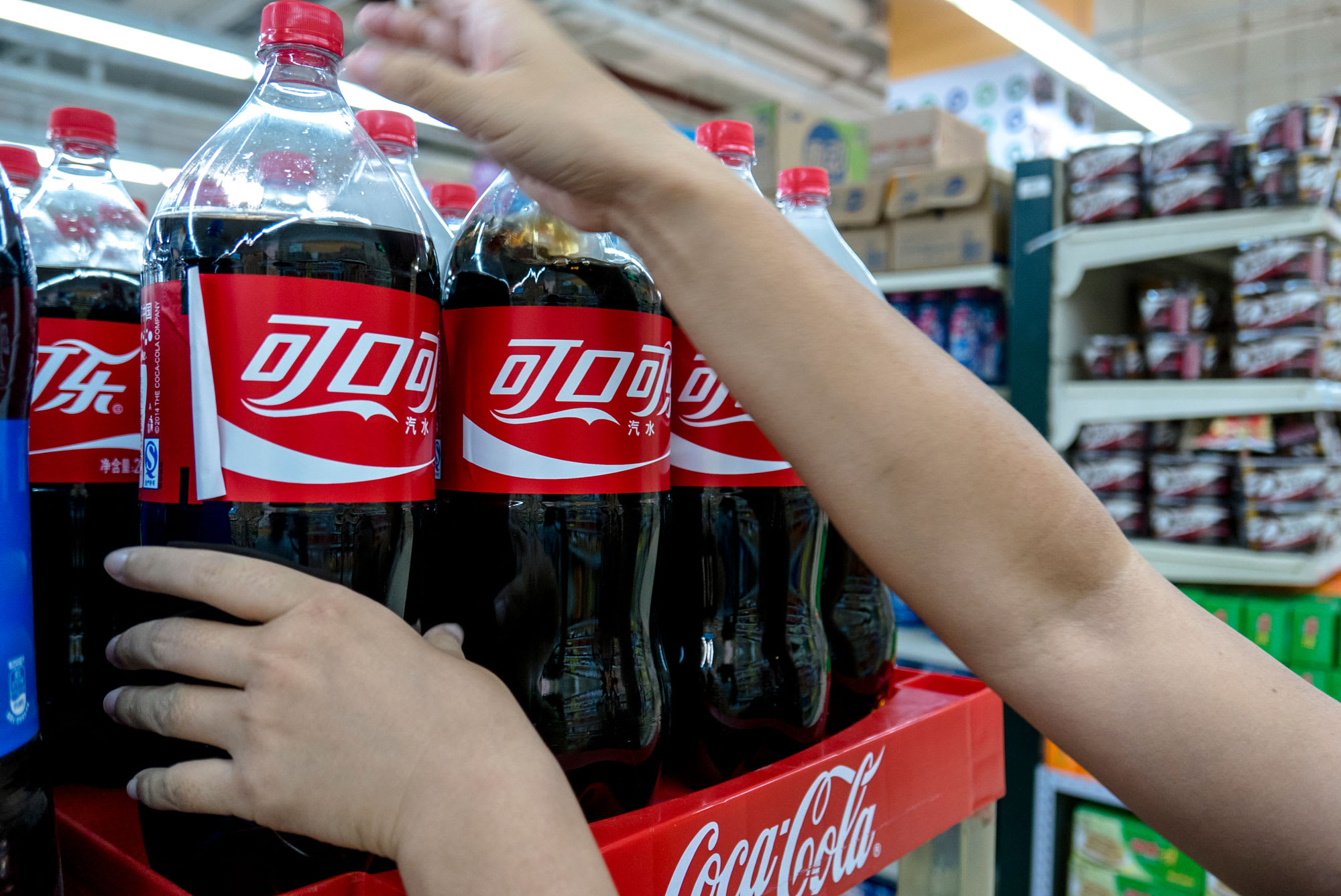 Coca-Cola takes an earnings hit, Iran confirms extra circumstances