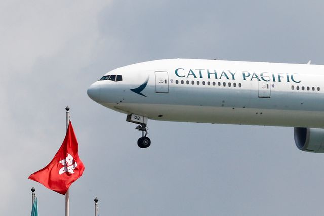 Cathay Pacific warns of considerable H1 loss, slashes extra capability