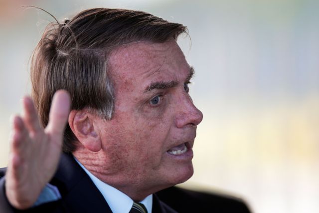 Brazil’s Bolsonaro flags democracy menace from coronavirus