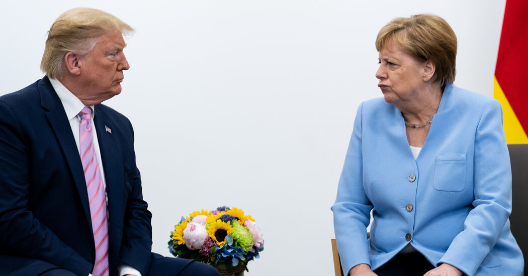 On Trump, Merkel’s Face Does the Speaking