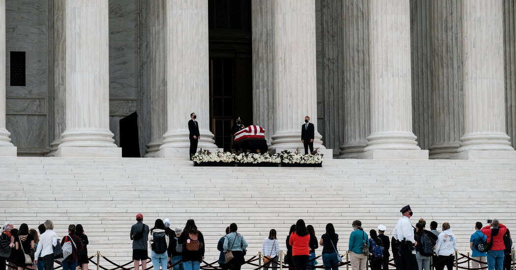 ‘Vote him out,’ protesters chant as Trump visits Justice Ginsburg’s coffin.