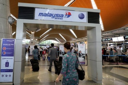 EXCLUSIVE-Malaysia Airways dad or mum firm says group is operating out of money -letter