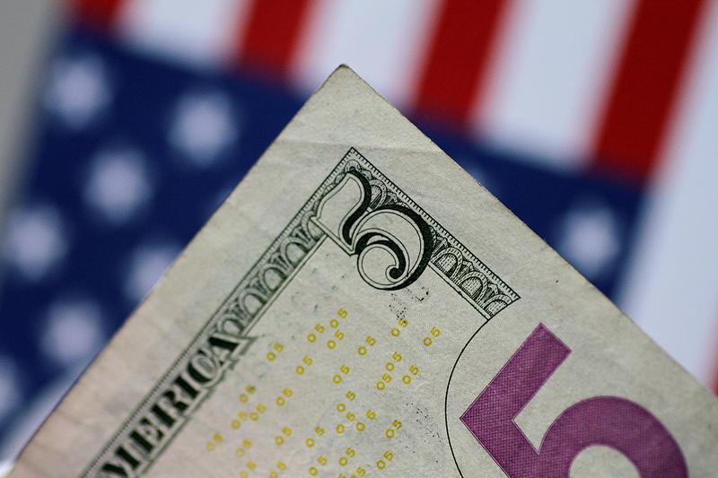 Greenback slips on report that U.S. stimulus talks to renew