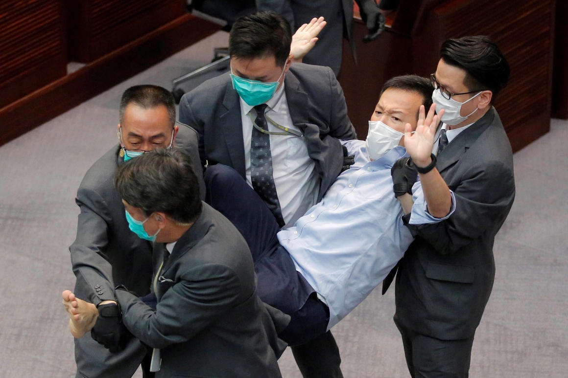 Former pro-democracy lawmakers arrested in Hong Kong Former pro-democracy lawmakers arrested in Hong Kong
