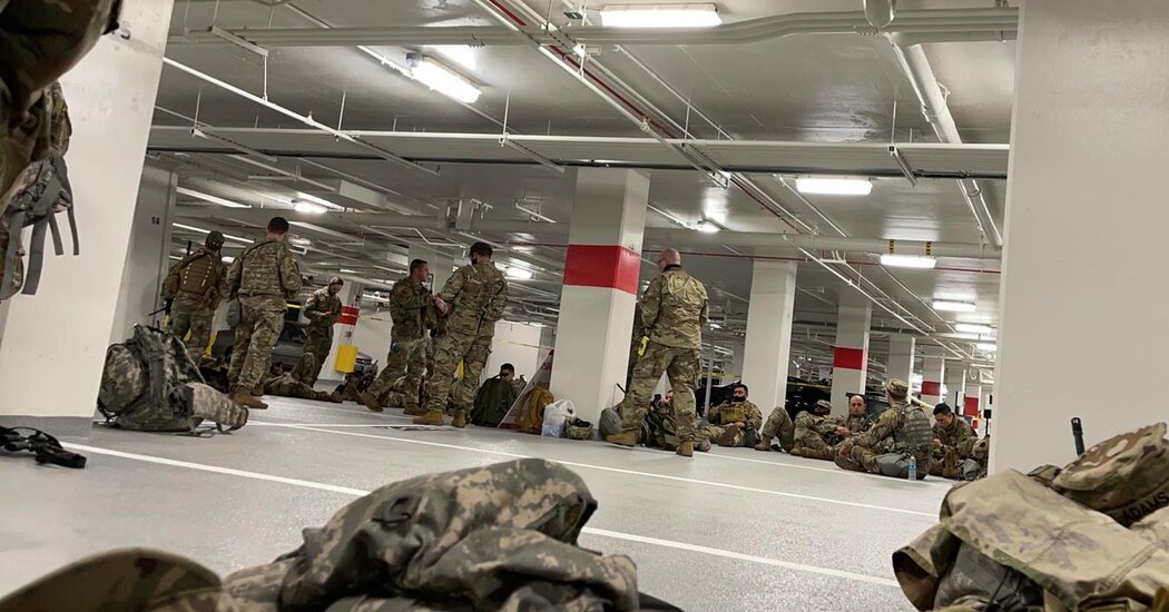 Nationwide Guard troops who protected the Capitol for Biden’s Inauguration have been instructed to sleep in a parking storage.