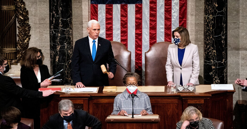 Congress confirms Biden’s election, hours after a pro-Trump mob stormed the Capitol.