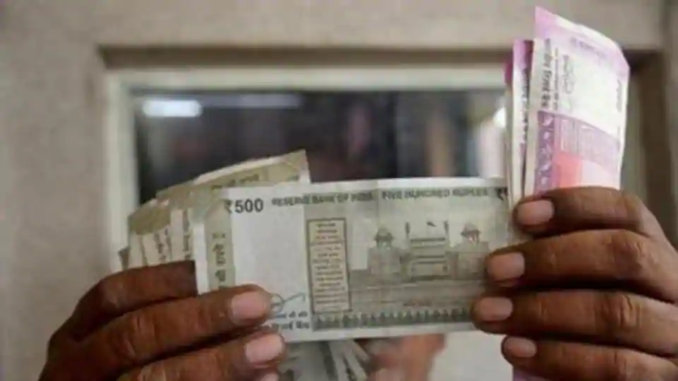 Rupee settles four paise decrease at 73.11 in opposition to US greenback – enterprise information