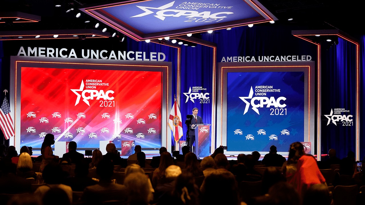 CPAC hosts booed for asking attendees to put on masks