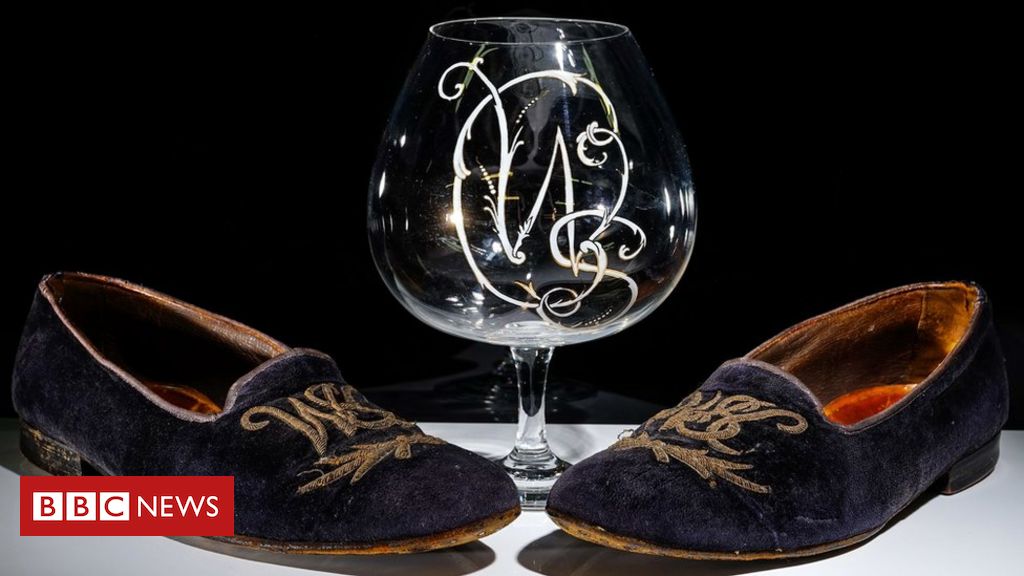 Winston Churchill's velvet slippers fetch almost £40,000