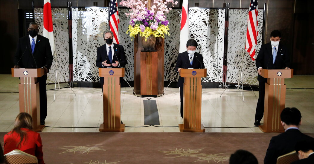 Visiting Japan, Prime U.S. Envoys Set Combative Tone for China Talks