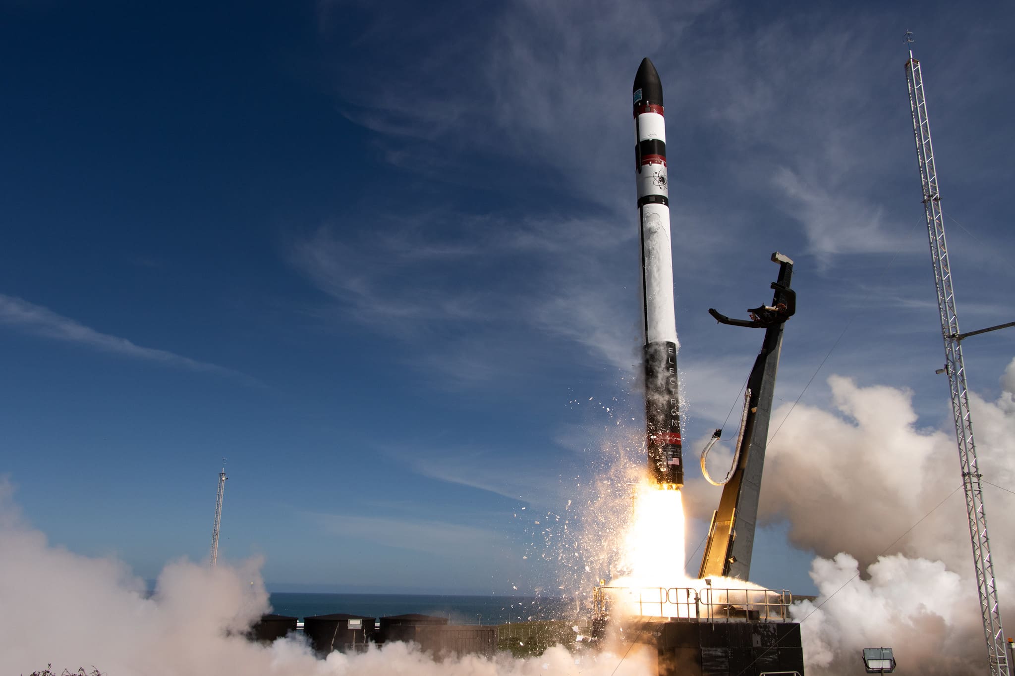 Rocket Lab begins buying and selling on Nasdaq as RKLB after SPAC merger
