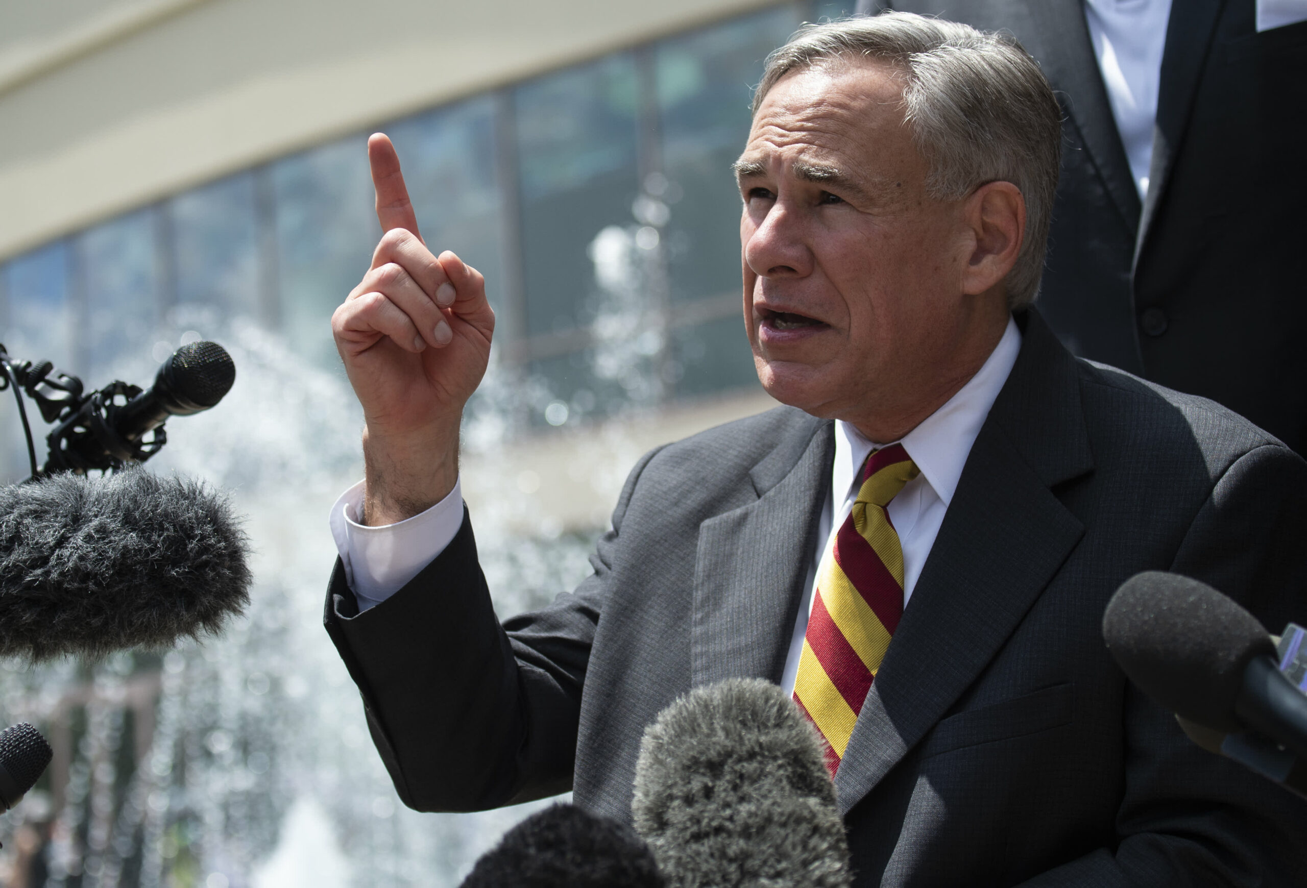 Texas Gov. Abbott threatens to nice cities and native officers in the event that they impose masks mandates