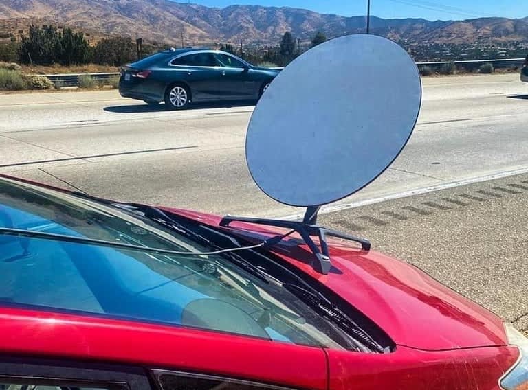 CHP tickets driver with obvious SpaceX Starlink dish on hood