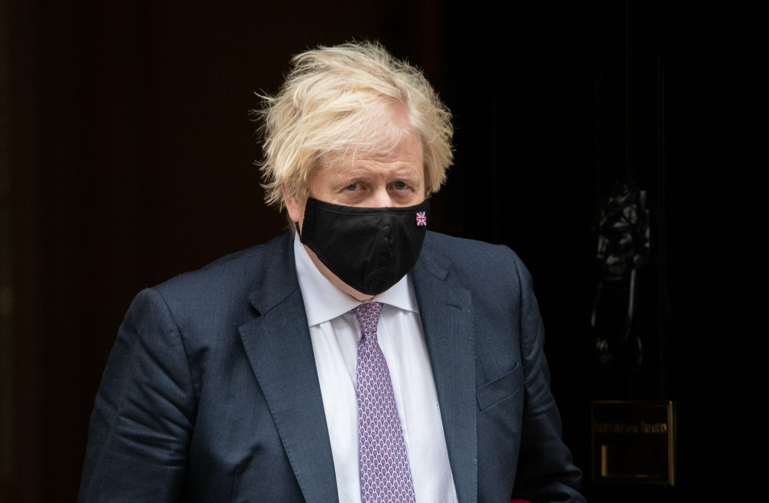 Prime Minister Boris Johnson says at least one patient has died with omicron