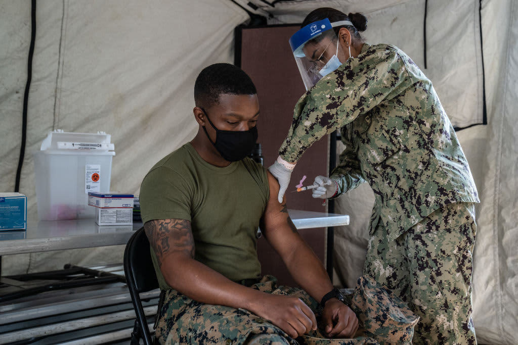 Pentagon to require all service members to get Covid vaccine by mid-September