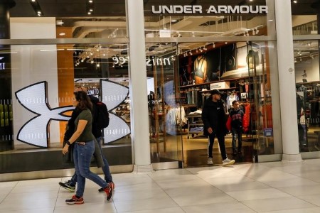 Athletic attire maker Underneath Armour raises annual forecasts on increased demand