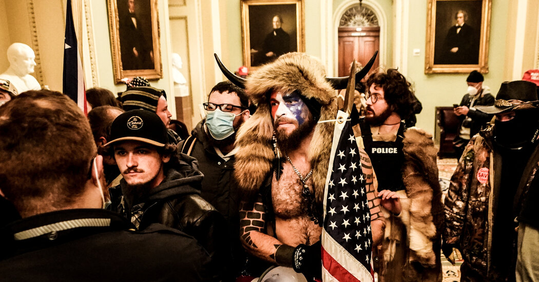 Capitol Rioter Generally known as QAnon Shaman Pleads Responsible