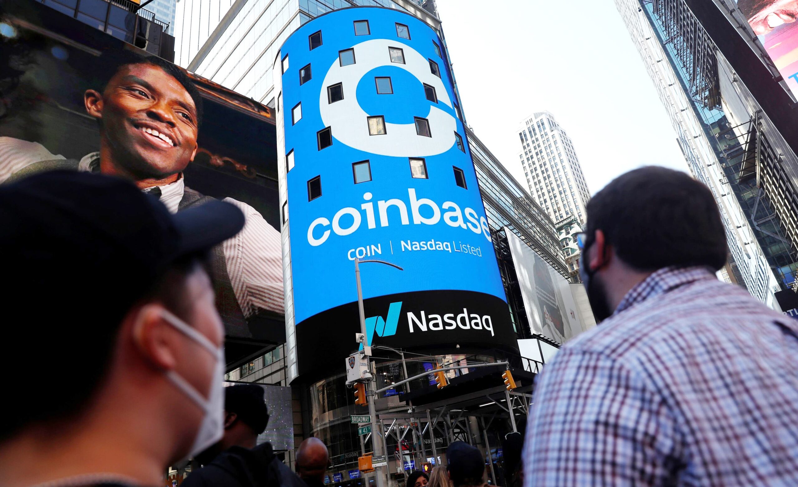 Coinbase shares fall after it reveals SEC plans to sue over interest-earning product
