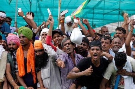 Offended Indian growers collect outdoors Delhi to protest farm legal guidelines