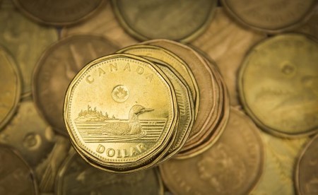 CANADA FX DEBT-Canadian dollar hits 6-day low as month-end buying lifts greenback