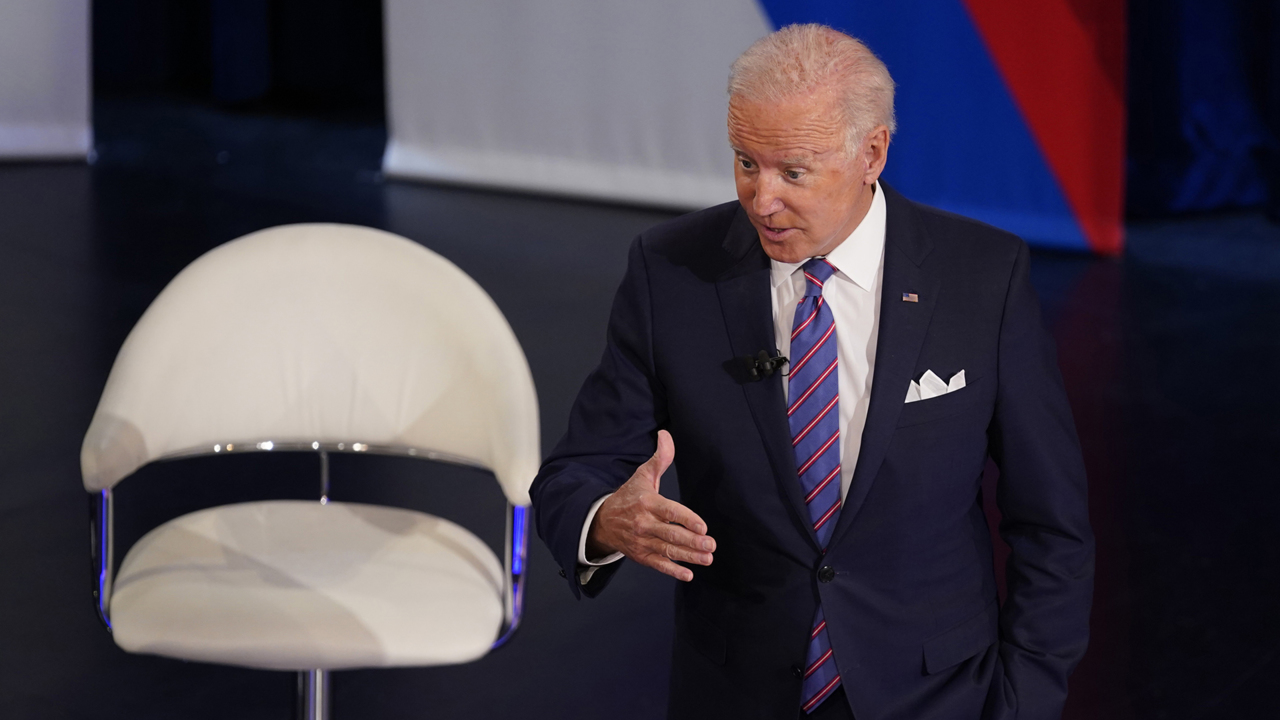 Biden uses town hall to name-check Manchin and Sinema on agenda hold-ups