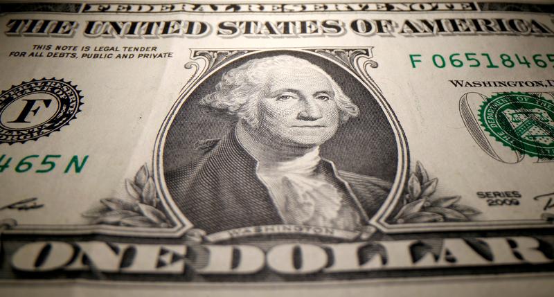 Dollar drifts below one-year high as payrolls test looms large
