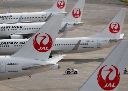 Japan Airlines narrows H1 loss on cost cuts, flags annual loss