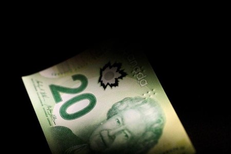 CANADA FX DEBT-Canadian dollar weakens by most in three months as oil tumbles