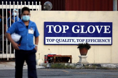 Top Glove profit slumps, company warns of weak demand