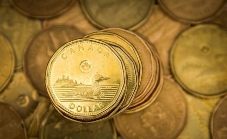 CANADA FX DEBT-Canadian dollar at nearly 3-month low as oil prices fall