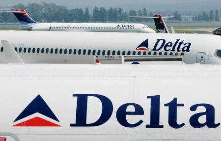 Delta to cancel over 250 flights due to bad weather, Omicron cases