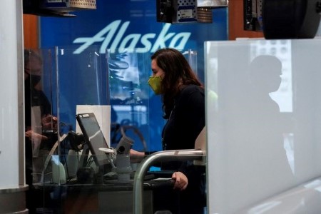 Delta offers waivers, Alaska cuts schedule amid severe winter, virus surge