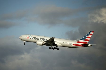 American Airlines loss narrows on strong holiday travel demand