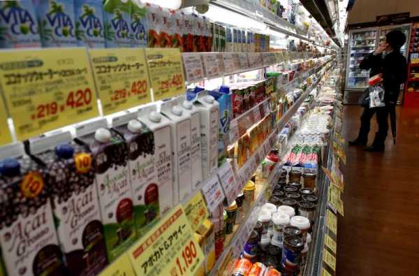 Japan’s inflation hovers around 2-year high, BOJ flags price pressure