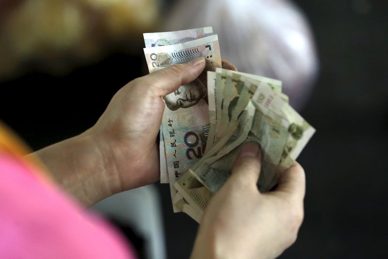 Brazil central bank quadruples exposure to Chinese yuan By Reuters