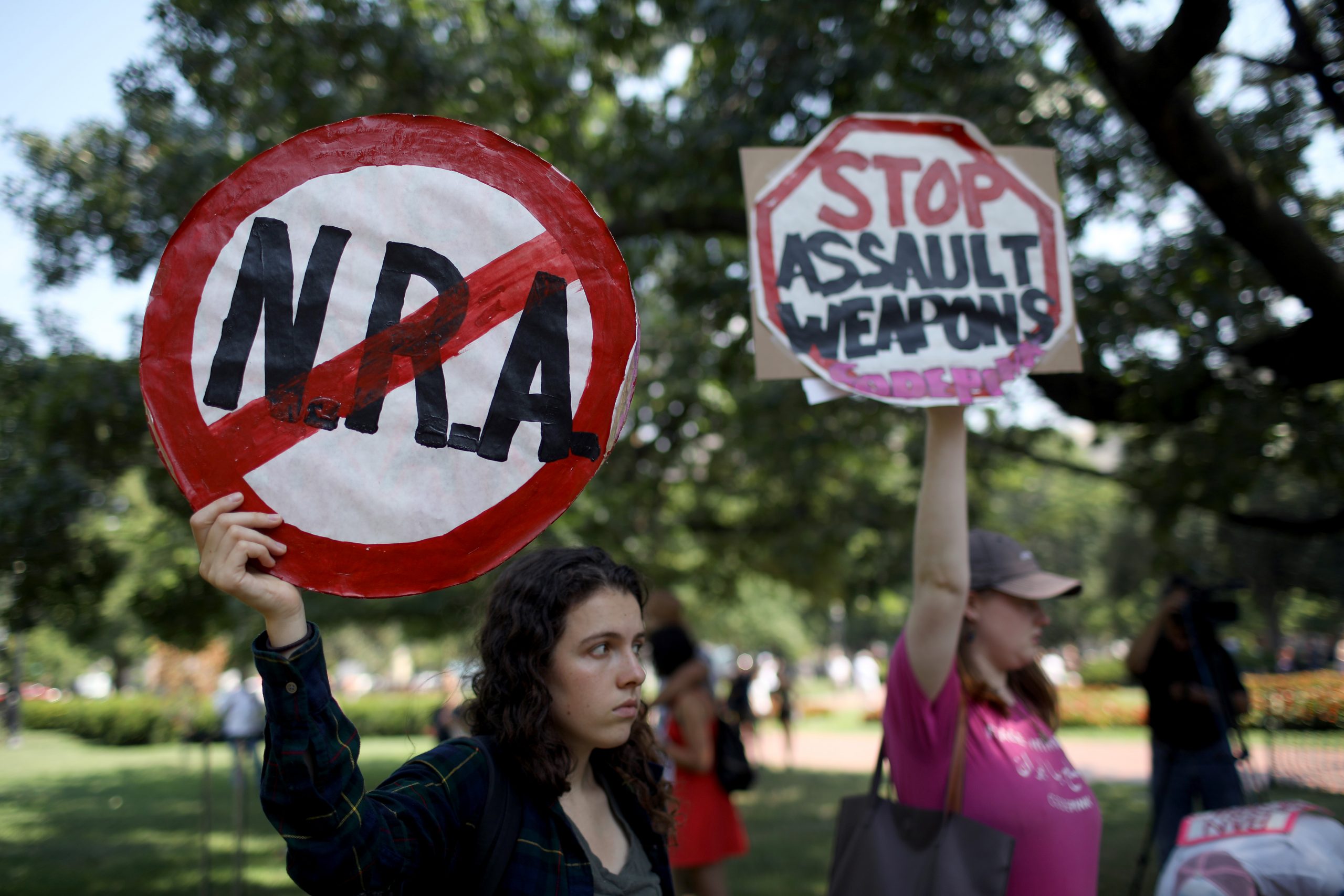 'Enough is enough' say thousands demanding new gun measures
