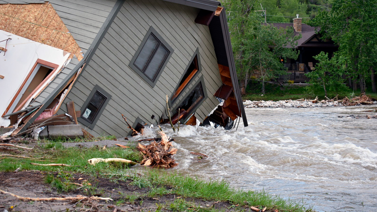 Floodwaters wash away houses in Yellowstone