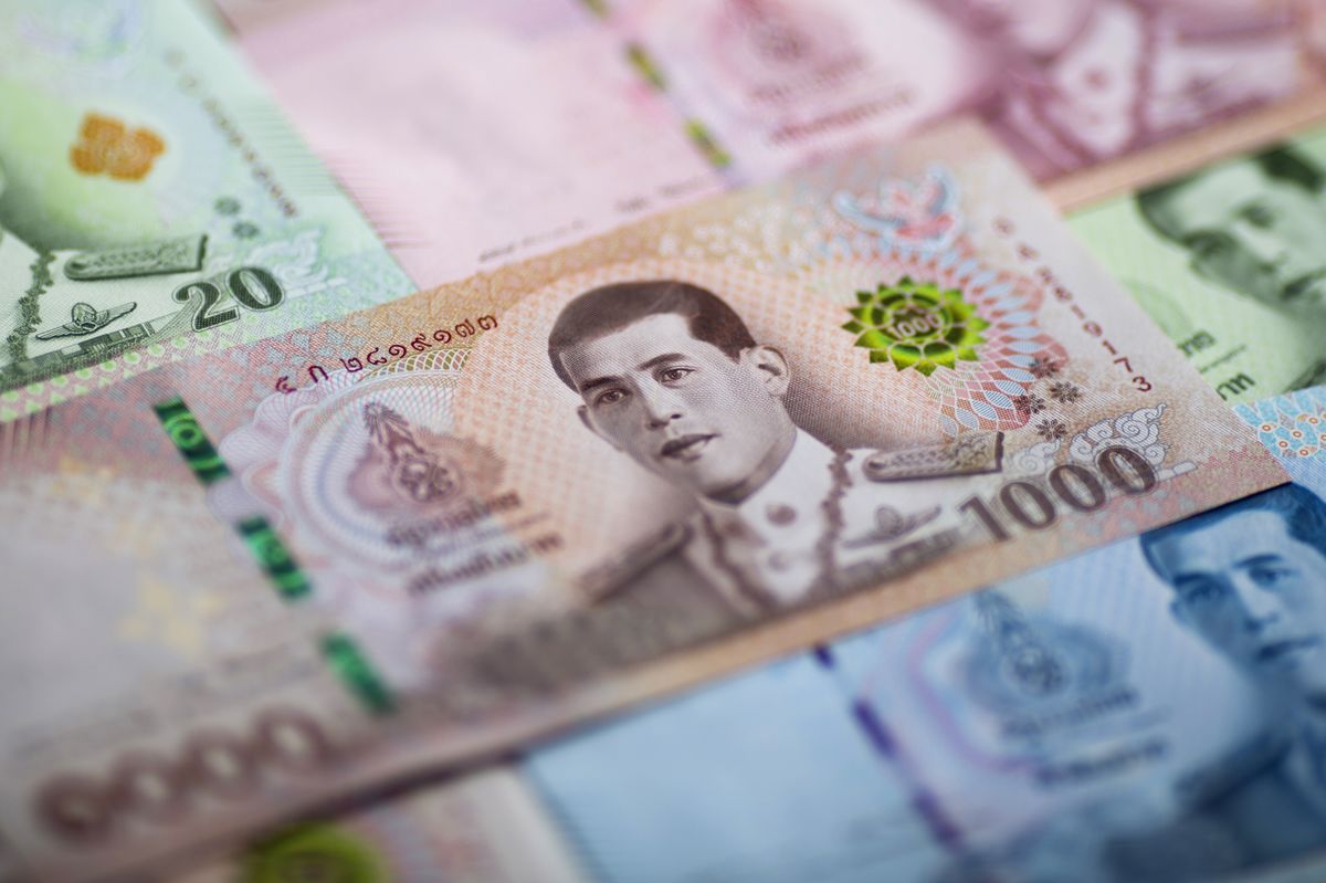 Asian forex bears climb multi-year highs as short bets on Thai baht rise most