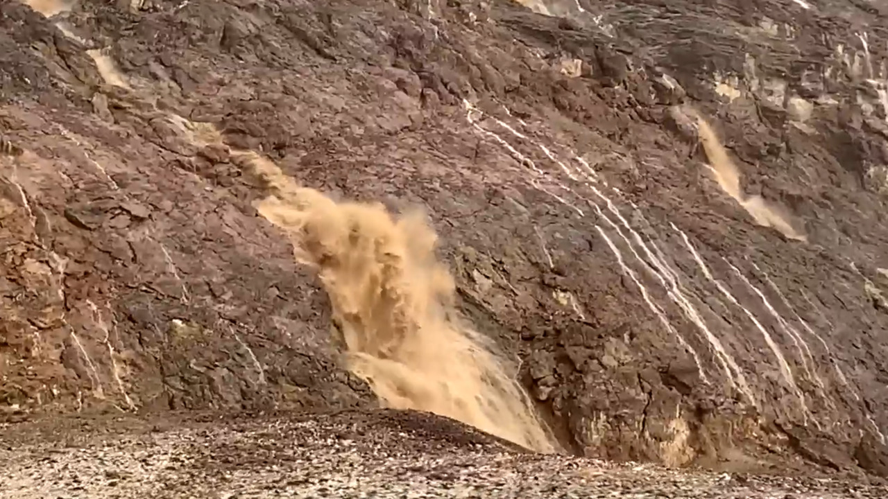 Waterfalls rush in Death Valley National Park due to recent rain