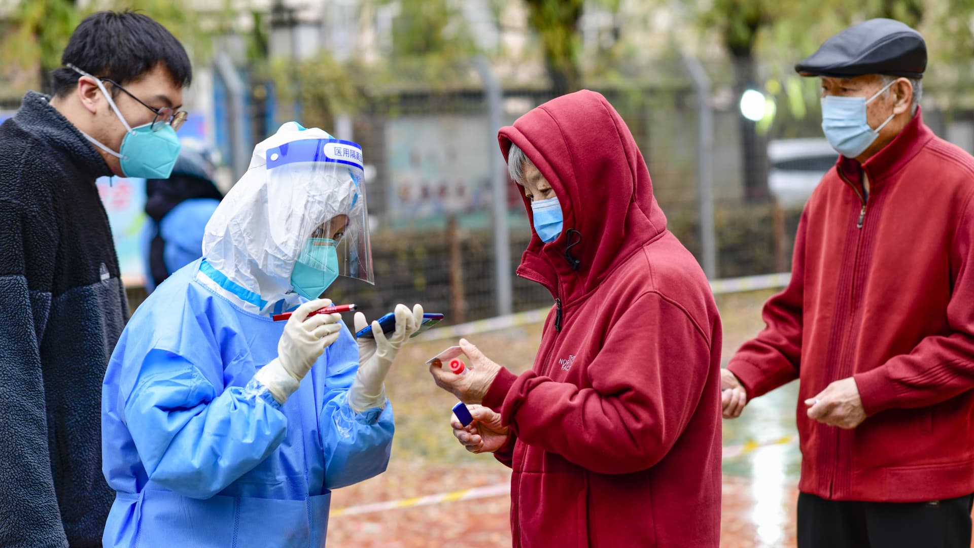China trims Covid quarantine time by two days