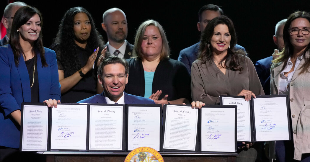 DeSantis Signs Tall Stack of Right-Wing Bills as 2024 Entrance Nears