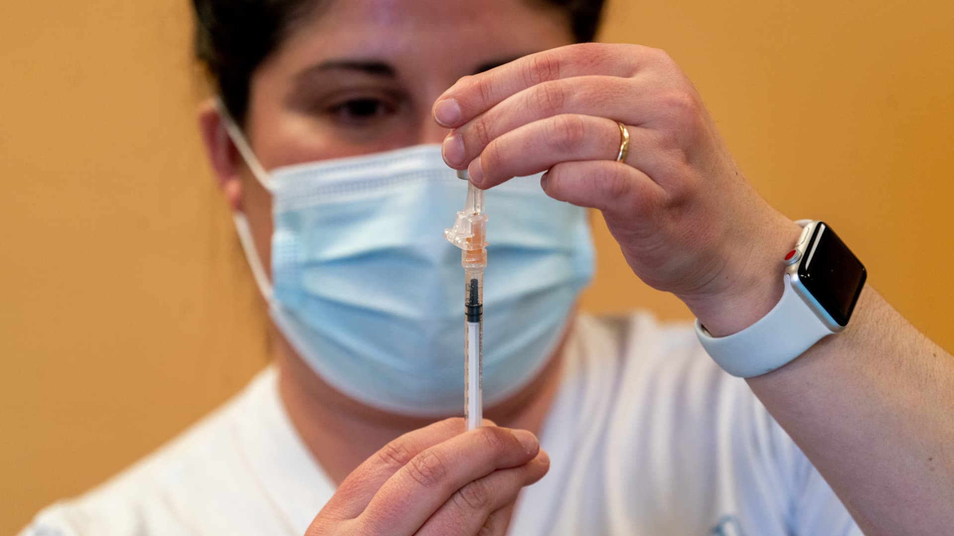 Biden HHS to provide free Covid vaccines for uninsured through 2024