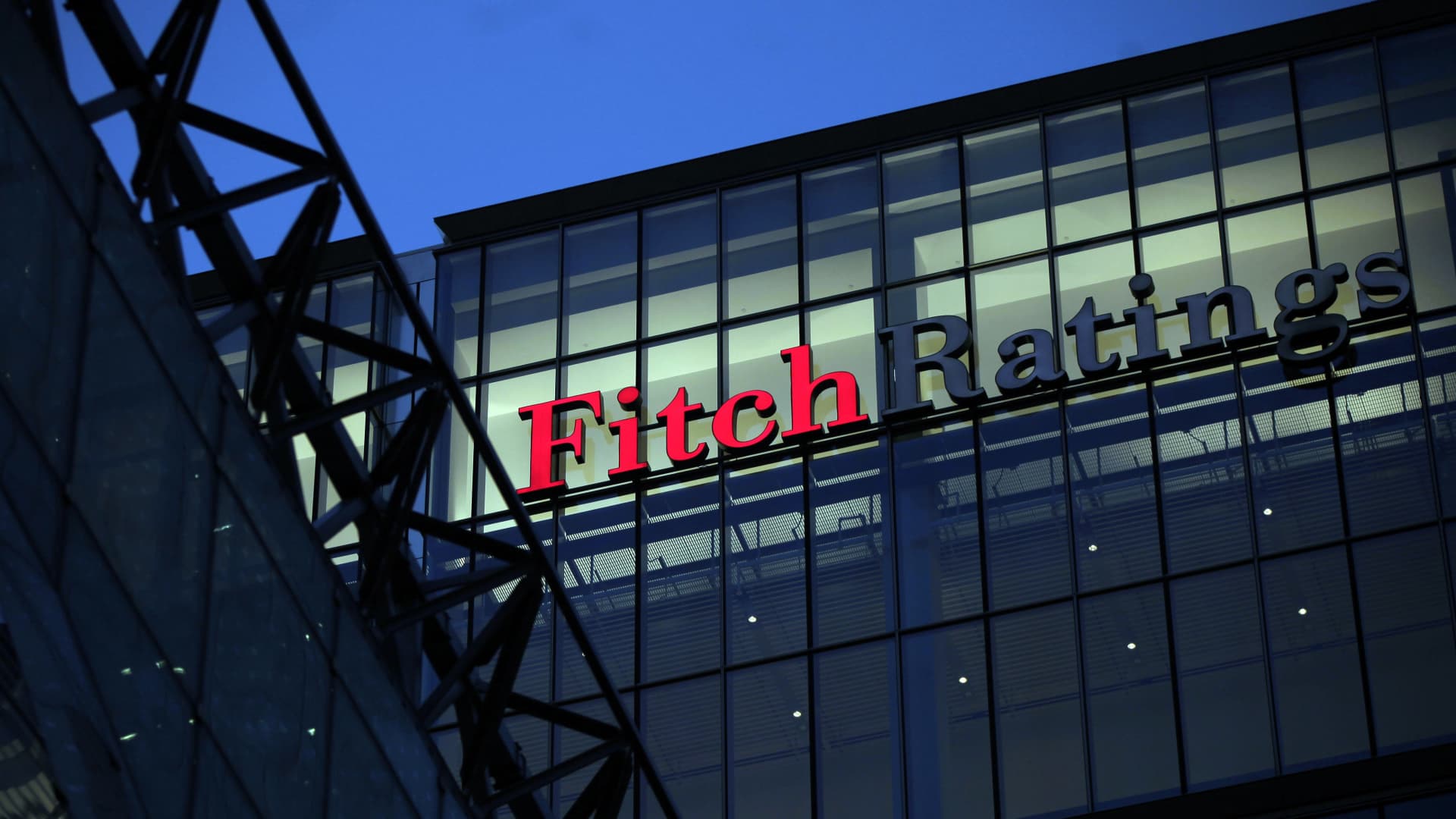 Fitch warns it may be forced to downgrade dozens of banks