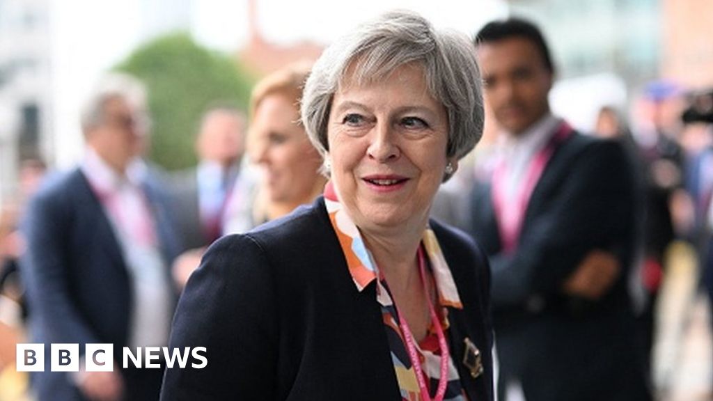 Net zero isn't act of economic harm, Theresa May says