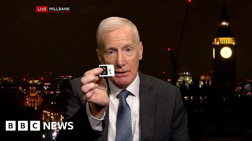 Why did MP Gregory Campbell hold up a postage stamp on TV?