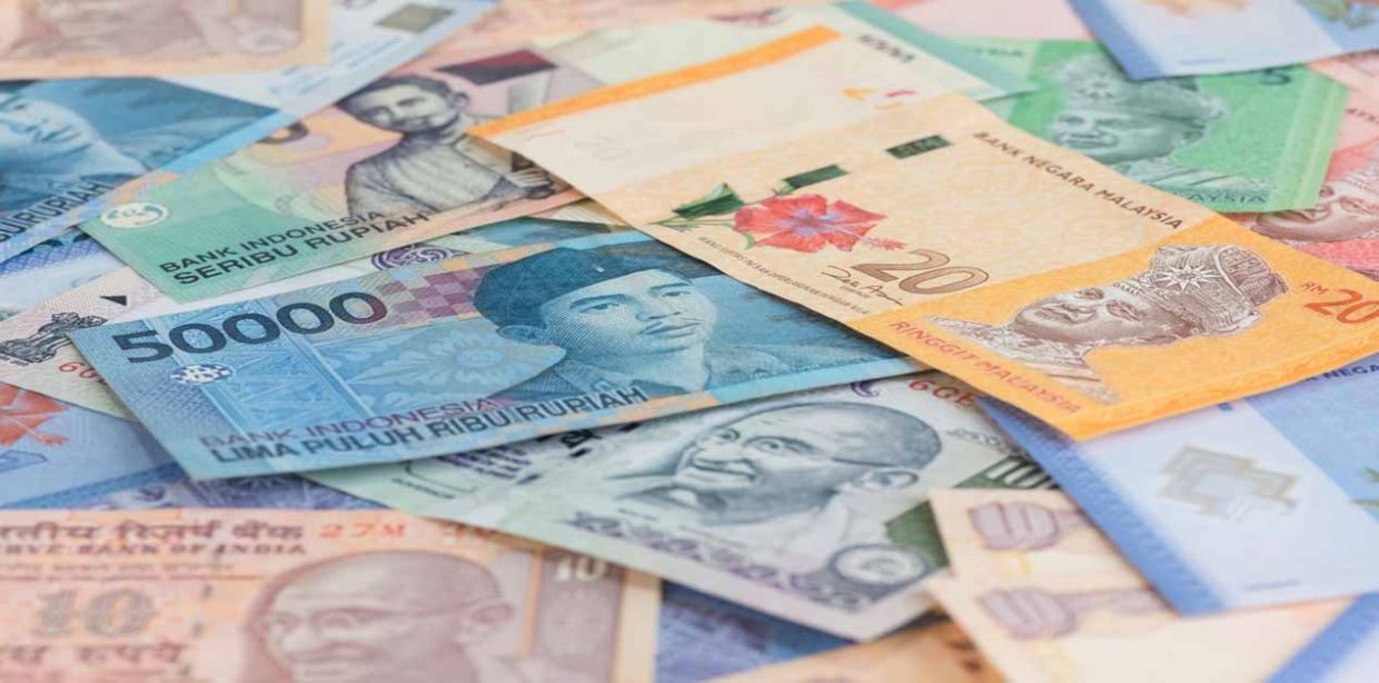 Asian FX subdued after mixed US data; equities set for weekly gains